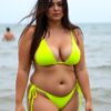 Curvy Brunette in Neon Yellow Bikini at Beach
