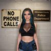 Teal-Haired Vixen in Police Station Cell
